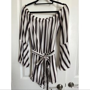 Striped romper with bell sleeves. Comes with matching belt.